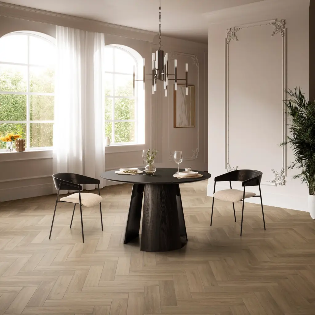 Mesa Zuri redonda de comedor en color negro con base central de diseño contemporáneo