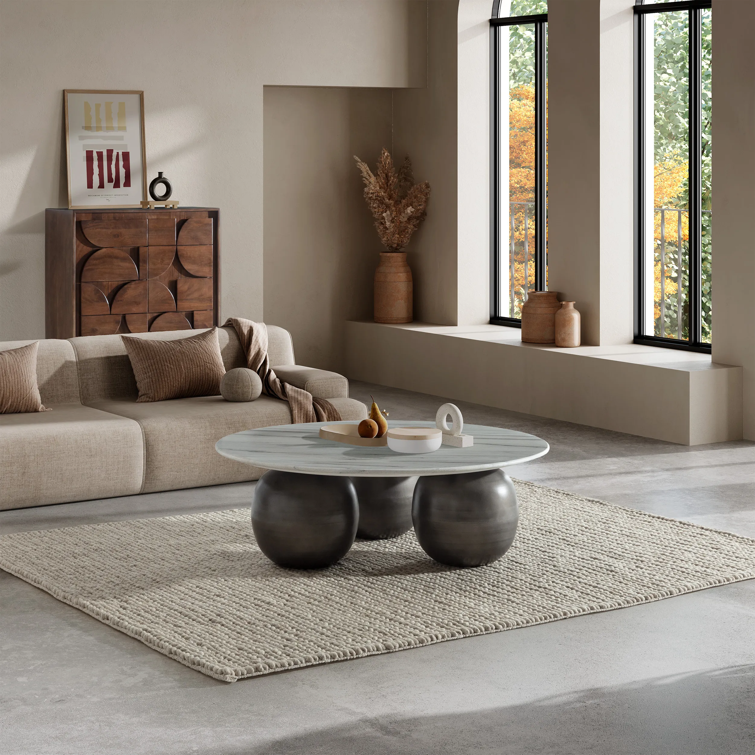 Mesa de centro Tanya redonda con acabado mármol blanco y base curva para salón moderno