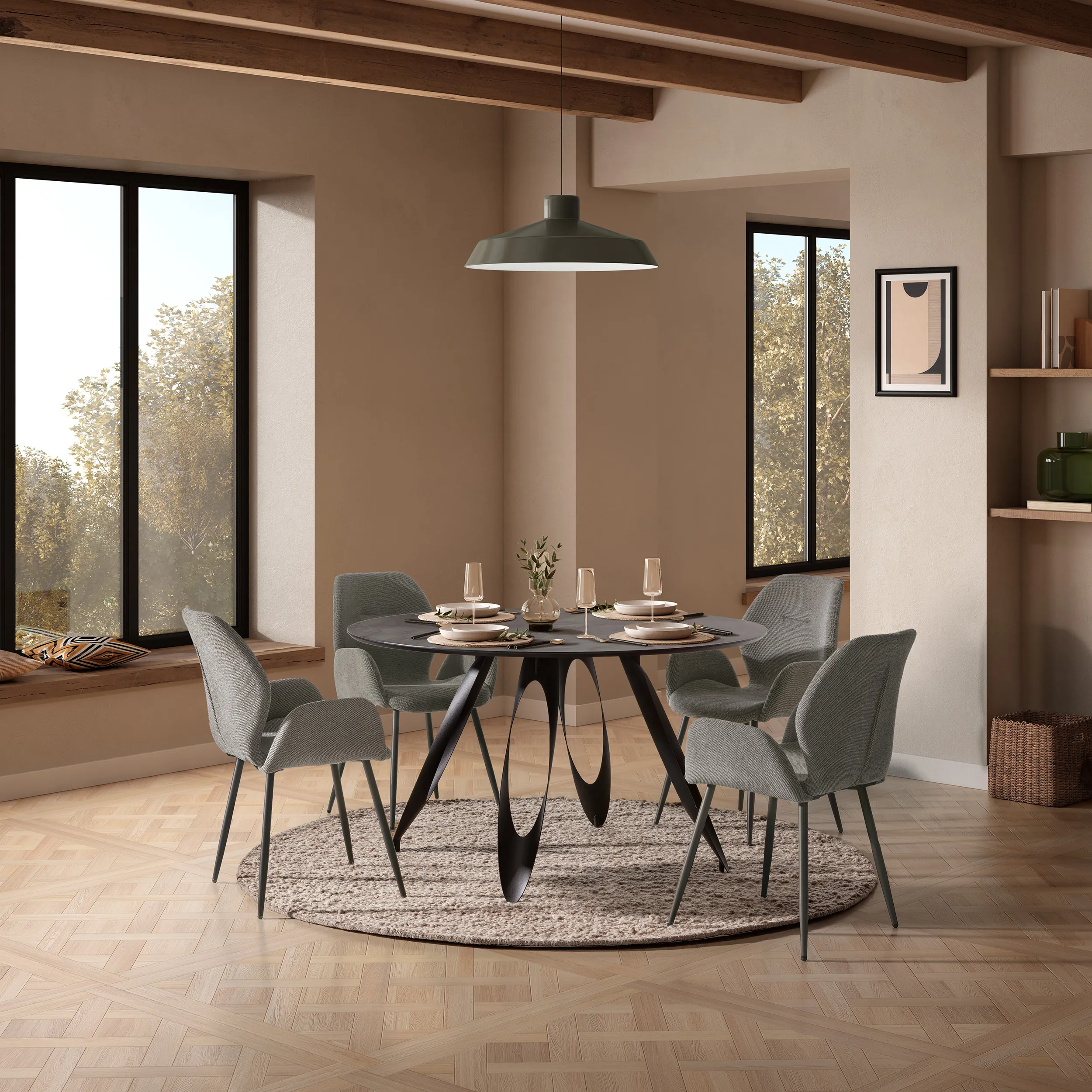 Mesa Anora redonda de comedor con acabado efecto cemento y estructura de metal negra
